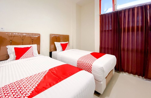 Padang Hotel | Capital O 3092 Falah Residence Syariah