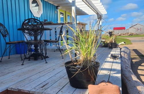 North Lake House | Captain’s Den is our executive blue toned all wooden room with a Captain’s flair