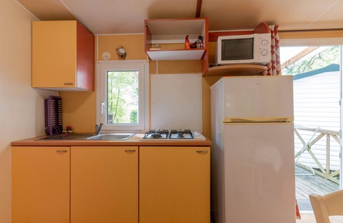 Vallon-Pont-d'Arc RV Rental | Caravan 'Midi - Mobil Home 4-6 Pers' with Private Terrace and Shared Garden