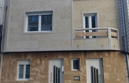 Carril House | Casa adosada con pequeño patio