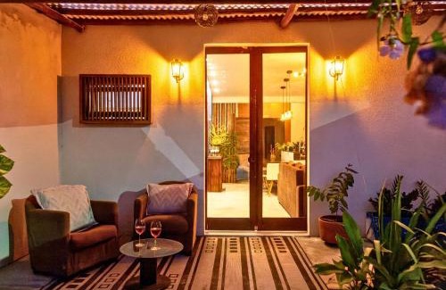 Porto Seguro House | Casa com 2 quartos em condomínio tranquilo, suíte com cama king, ar-condicionado, Wi-Fi rápido, cozinha equipada e garagem privativa