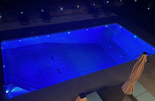 Tallman House | Castle on a rock heated pool in may