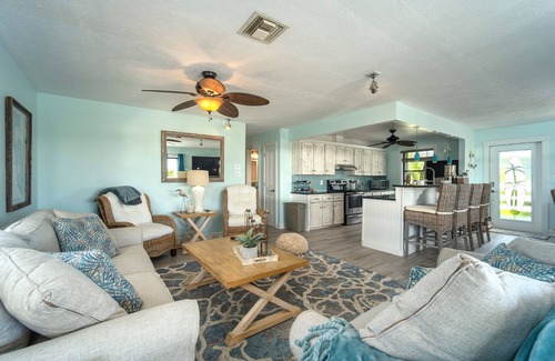 Breezeswept Beach Estates House | Cayman Retreat | Cozy coastal pool home with boating on Ramrod Key