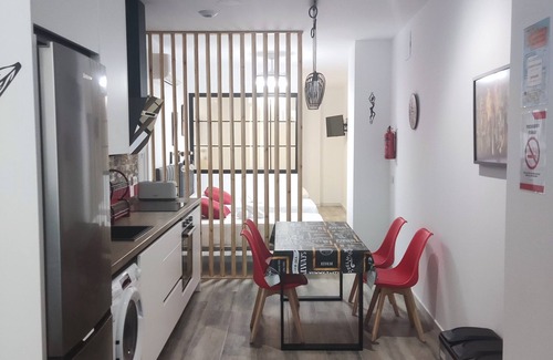 Ciudad Jardin Apartment | Centrally located, at street level and next to bus and train stations.