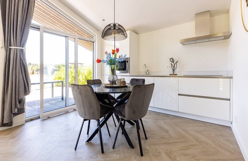 Municipality of Veldhoven Ski Chalet | Chalet by Pond in Holiday Park