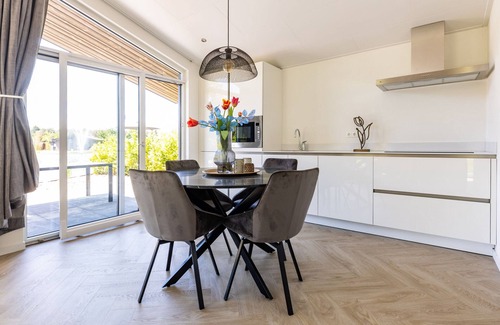 Municipality of Veldhoven Ski Chalet | Chalet by Pond in Holiday Park