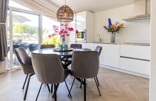 Municipality of Veldhoven Ski Chalet | Chalet by Pond with Sauna