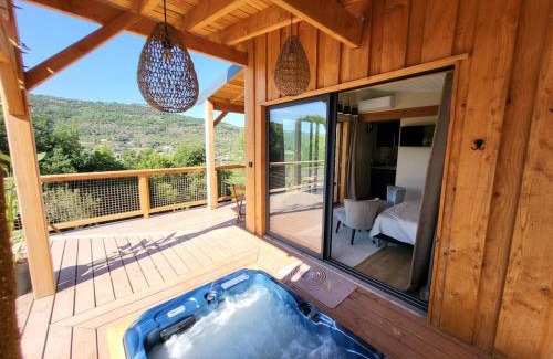 Saint-Affrique Ski Chalet | Chalet, hot tub and pool, quiet and with a view Sawadee lodge spa