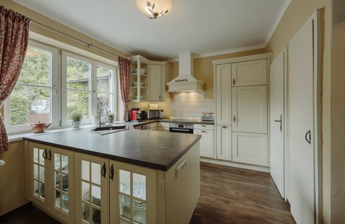 Sankt Johann im Pongau Ski Chalet | "Chalet Lerch" with Mountain View, Garden, Shared Pool & Wi-Fi