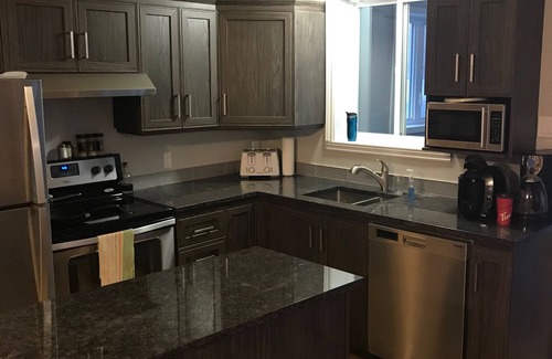 L'Anse-Saint-Jean Ski Chalet | Chalet on the side of water in a beautiful village