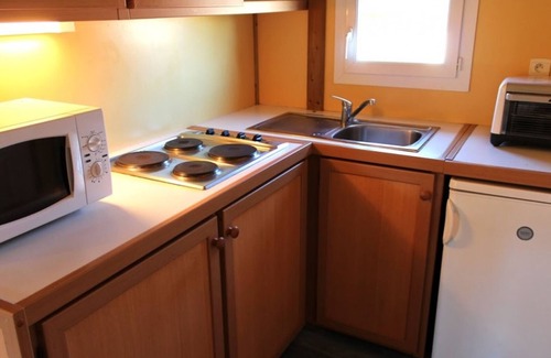 Treignat Cottage | Chalets Familiaux avec Terrasse, Activités en Été et Tous Conforts au Camping 2 Étoiles