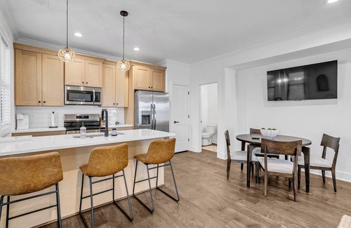 Dunean House | Charming 3-BR townhome < 1 Mile from Fluor Field: Garage, E-Bike Rental, 2KingB