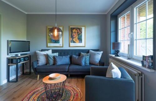 Aventoft Apartment | Charming and cozy holiday home with a fireplace