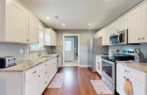 Fairview House | Charming home with hot tub, central AC, W/D, patio, and Views