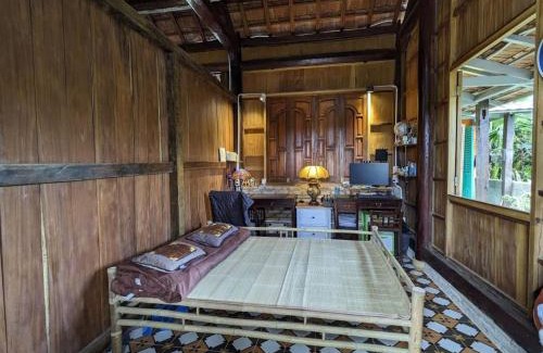 Bao Loc House | Charming Wooden House with Herbal Farm Vibes