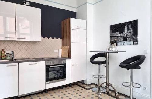 Hamelin Apartment | Charysma: Art nouveau meets modernity | darts | table football | car park