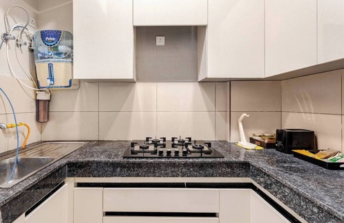 Noida Apartment | Chic 2-bedroom apartment with WiFi, AC in charming Noida