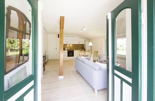 Hasselberg Apartment | Chicken coop - shower room, terrace, garden, sauna, close to the beach, child-friendly