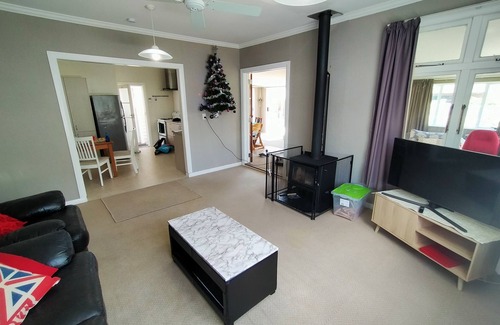 Otaki House | Classic Kiwi Bach at Otaki Beach. Pet and Family Friendly!