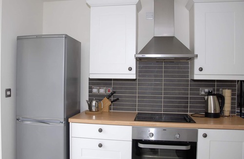 Borth-y-Gest House | Coastal with private lawn and a sea view garden