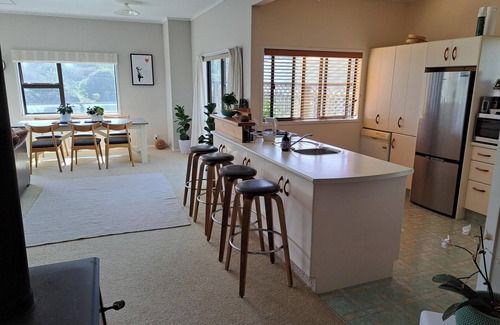 Baylys Beach House | Comfort and the Best Seat in the West to View the Tasman Sea
