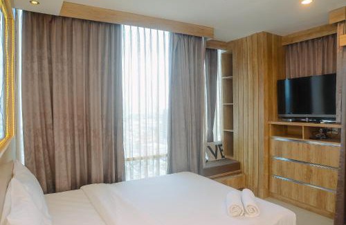 Pondokcina Apartment | Comfortable and Beautiful 1BR Apartment at Atlanta Residence By Travelio