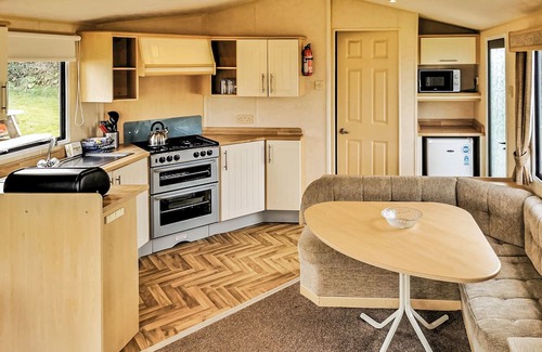 Perranporth House | Comfortable and spacious 12ft-wide caravan with one double and one twin.