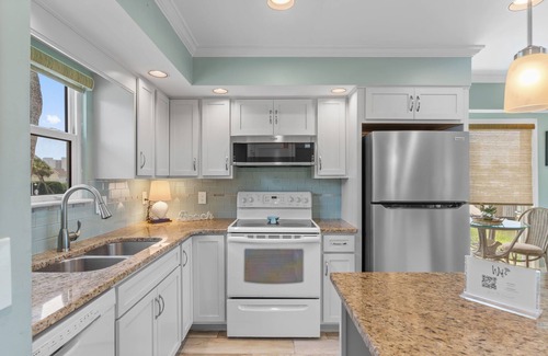 Holiday Isle Condo | Condo #1230 is a 2 Bedroom with Stunning Harbor Views and Free Beach Service!