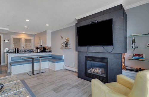Boyne City Condo | Condo with Lake Charlevoix Views | Private Beach Access | Gas-Log Fireplace