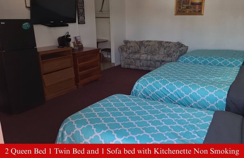 Hutchinson Hotel | Coratel Inn & Suites Hutchinson-2 Queen Bed NS -1 Queen Bed and 1 Full Bed