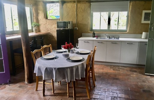 Tanja Cottage | Cosy mud brick cottage in a serene bush setting, near Tathra.