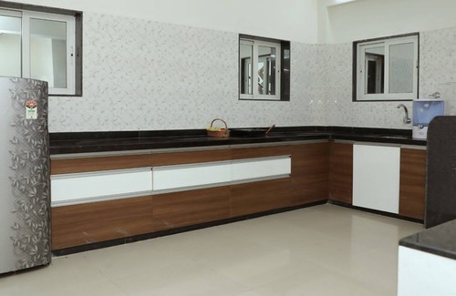 Navsari House | Cozy 1-bedroom bungalow with AC and fitness room in lovely UBHARAT