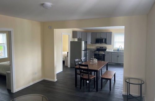 Guild Apartment | Cozy 2-bedroom apt-1 in Lakes Region with AC, WiFi, Pet friendly 2 queen beds