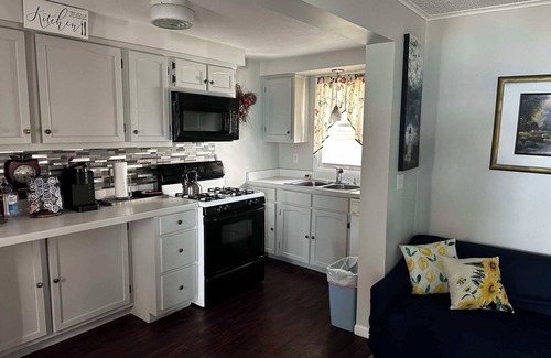 Tawas City Resort | Cozy 2-bedroom resort in Tawas City, MI on lake Huron with private deck/beach