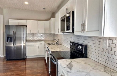 Omaha Apartment | Cozy 4 Bedroom 2 Bath Omaha Home w/plenty of parking!