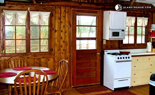 West Branch House | Cozy Cabin Rental with Stunning Lake Views in West Branch, Michigan