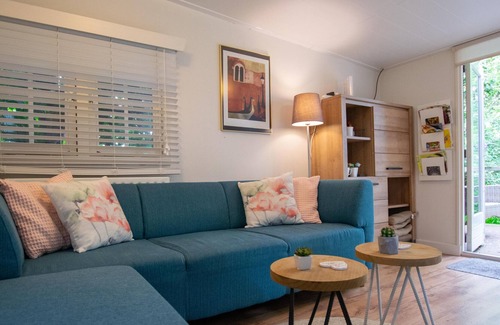 Heeswijk Ski Chalet | Cozy chalet with 1000m2 private garden