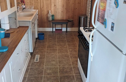 Ludington Cottage | Cozy cottage overlooking Hamlin Lake, a few minutes from downtown!