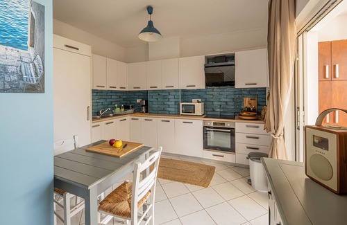 Nea Chora Apartment | Cozy, fully equipped seaview-apartment in Chania only 50m from the sandy beach.