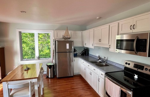 Cape Breton Regional Municipality Apartment | Cozy hideaway on the beautiful Bras d'Or Lakes. Sunset views and your own beach!