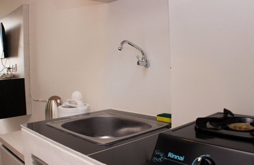 Karawang Apartment | Cozy Living Studio At Urbantown Apartment Karawang