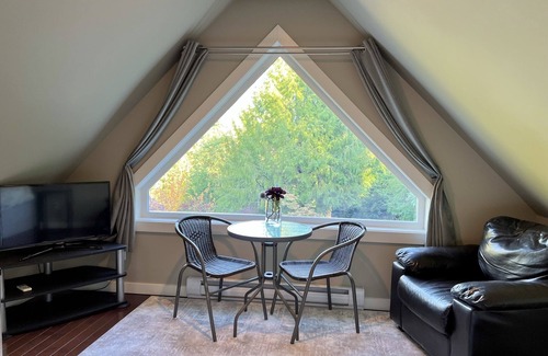 Shawnigan Lake Bed & Breakfast | Cozy Loft room with king bed and private entrance.