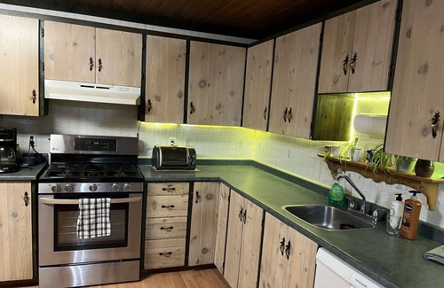 Telkwa House | Cozy rancher with wood heat and a fully fenced back yard.