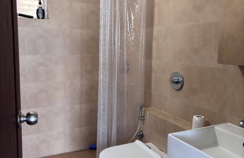 Agara Apartment | Cozy studio in pleasant Haralur with WiFi, AC and lake View