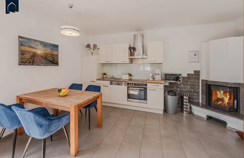 Korswandt Apartment | Cozy vacation apartment in Korswandt on the lake with balcony and lake view