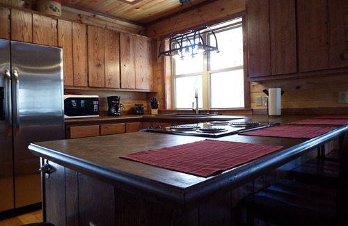 Hot Springs Cabin | Craftsman Style River House sitting on the French Broad River!