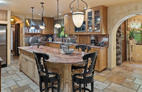 Sedona House | Creekside Chateau,patio overlooks Oak Creek, with steps directly to the water