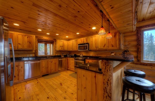 Lead House | Custom log lodge with private hot tub, gorgeous decks, game room & fireplaces