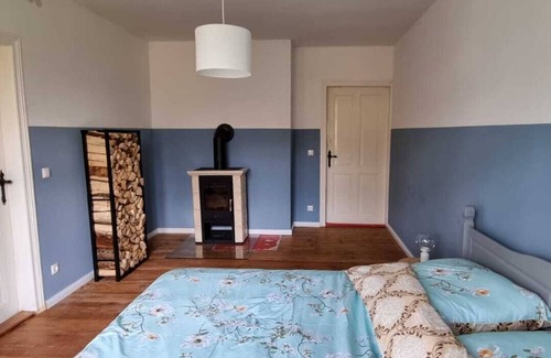 Nauen Apartment | Das Kaminzimmer im Forsthaus Nauen