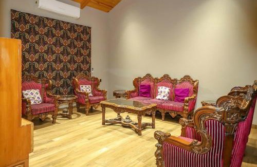 Anjar Villa | Desert Palms by StayVista in Kutch, nestled in orchards, features a swimming pool and a scenic balcony for a serene getaway